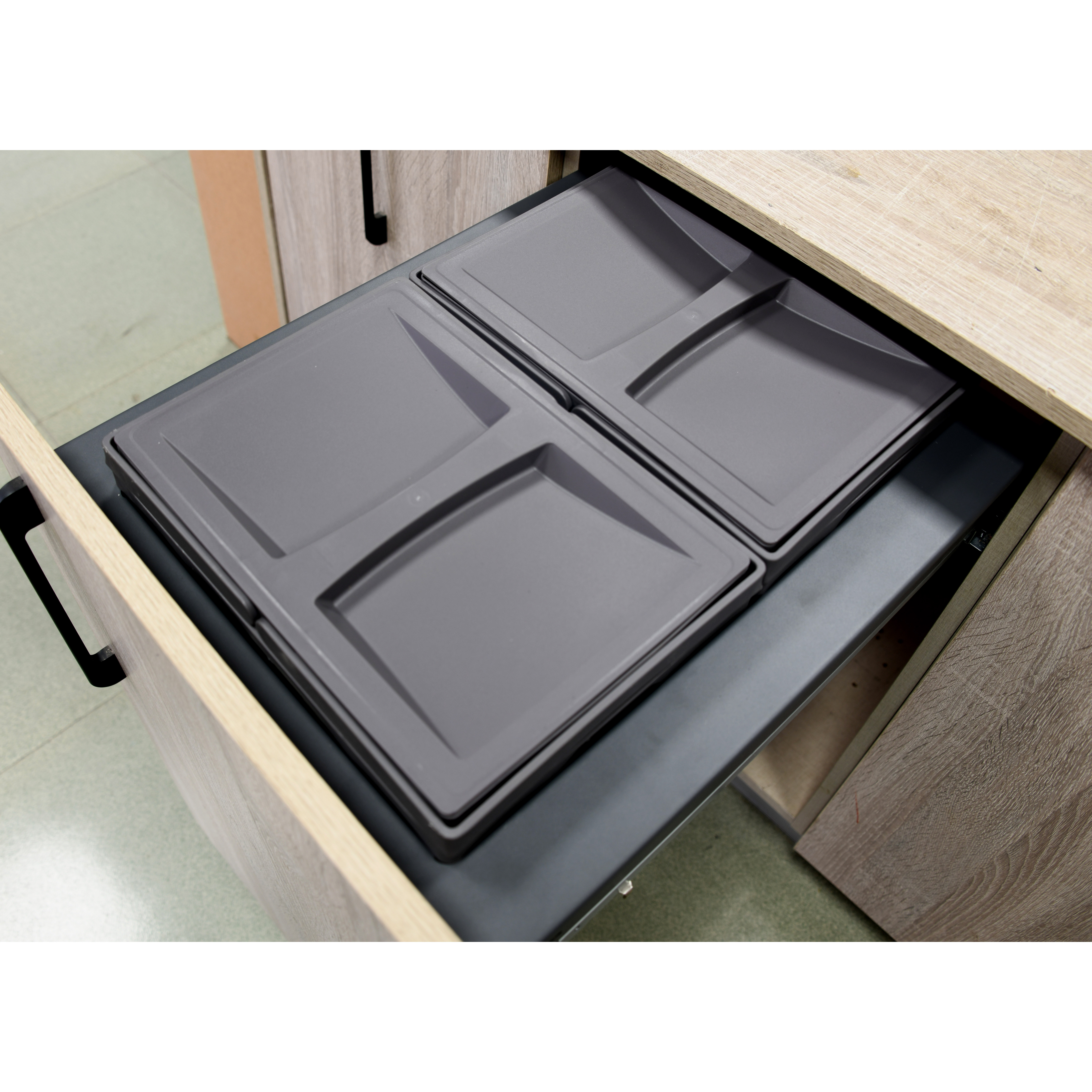Garbage bin inside the cabinet