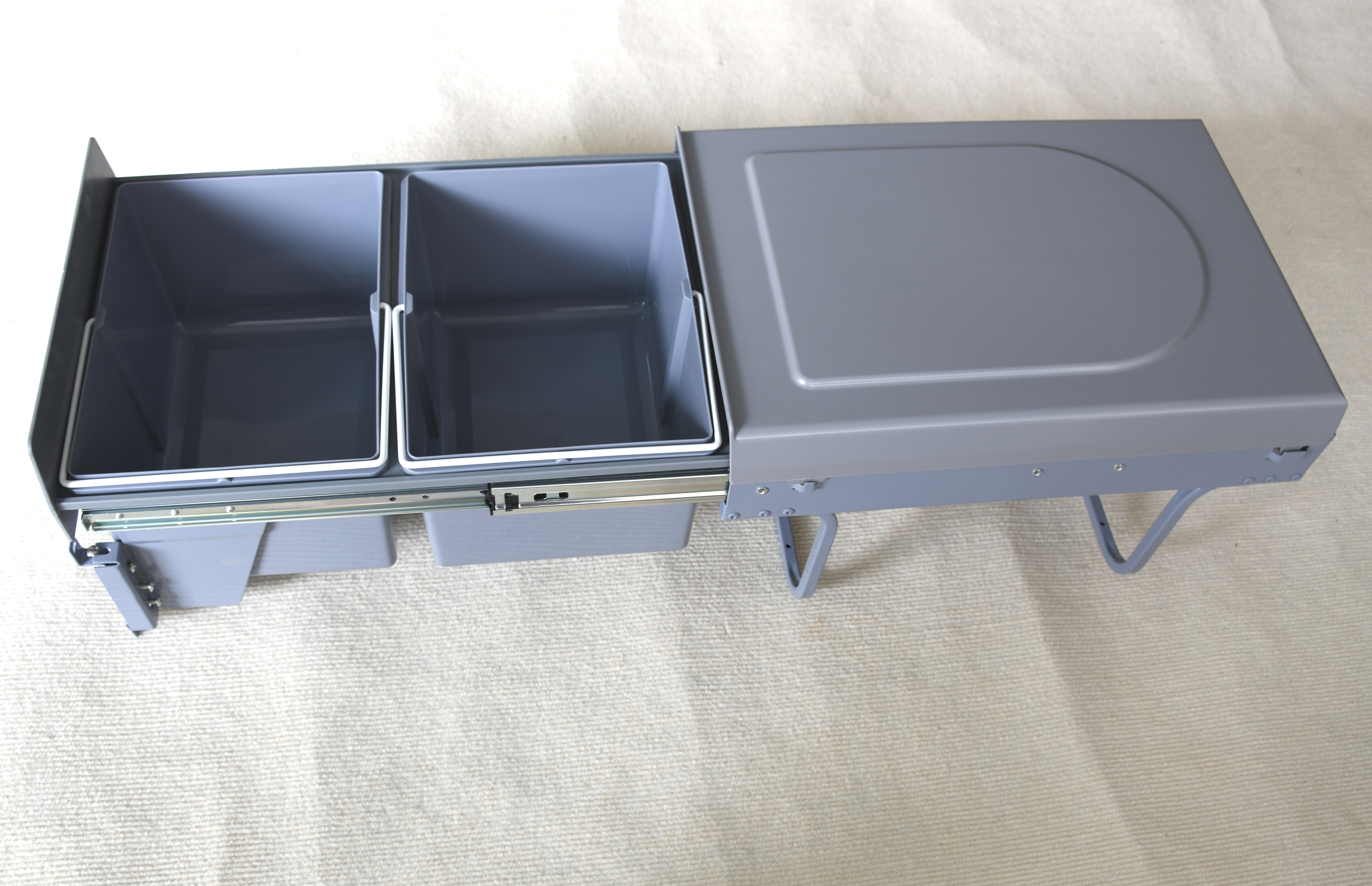 Garbage bin inside the cabinet