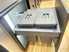 Four trash cans in the large-capacity cabinet 