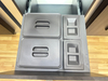 Four trash cans in the large-capacity cabinet 